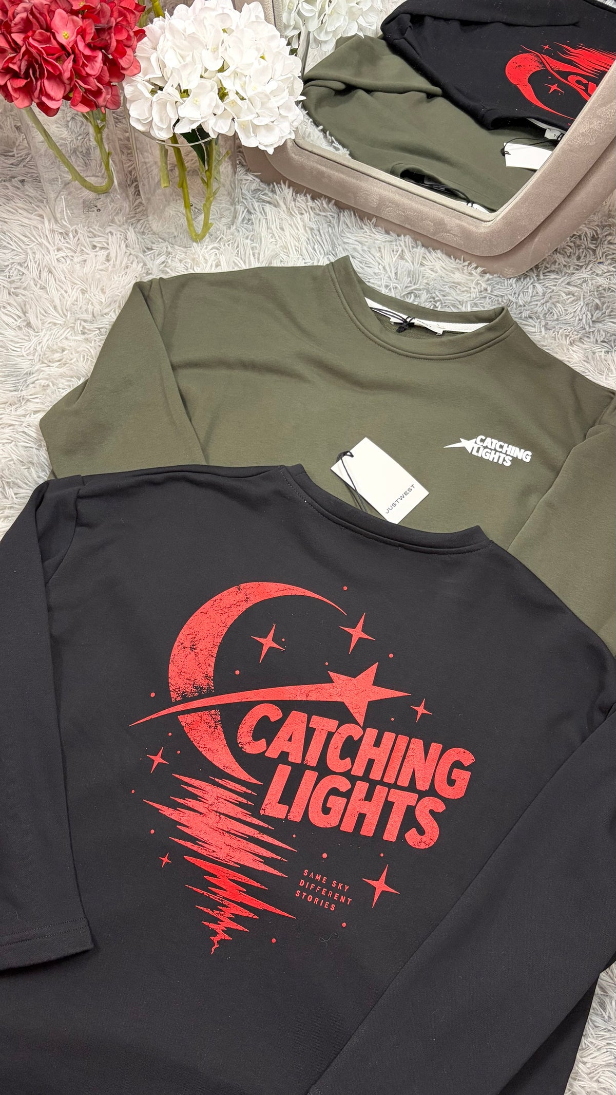 Felpa Catching Lights nera con stampa rossa e verdone